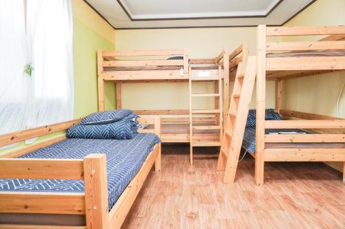 Cama o camas de una habitación en Empathy Guesthouse