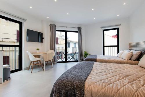 Postelja oz. postelje v sobi nastanitve The Residence City Centre - Modern Family Apartment with Rooftop Pool & Terrace - Children stay for Free