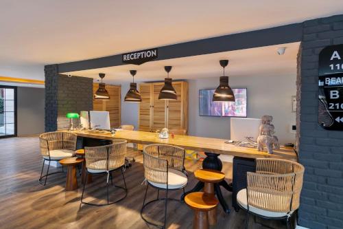 a conference room with chairs and a long table at Azuu Boutique Hotel in Antalya