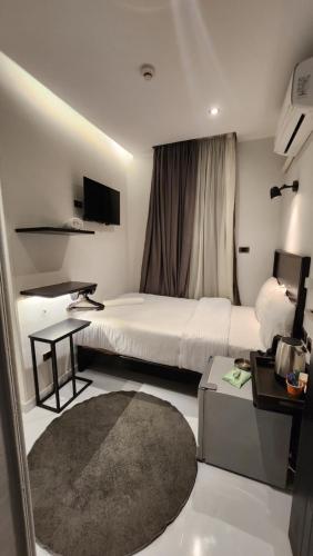 Helio Cairo Hotelにあるベッド