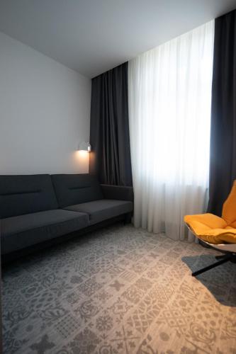 Posezení v ubytování Ibis Styles Sibiu Arsenal