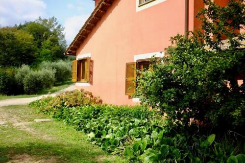 a house with a garden in front of it at Villa Flavia in Manziana