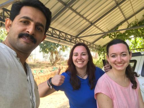 a man and two women posing for a picture at Western Ghats Holiday Home in Kalpetta