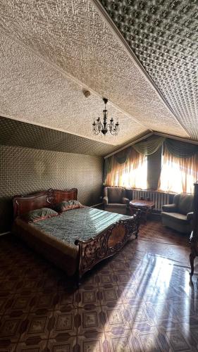 A bed or beds in a room at Лагуна