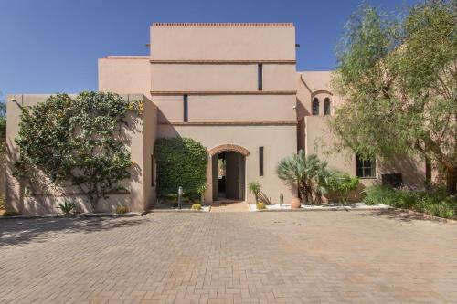 a house with a driveway in front of it at Luxury Villa GoldPalm Marrakech in Marrakech