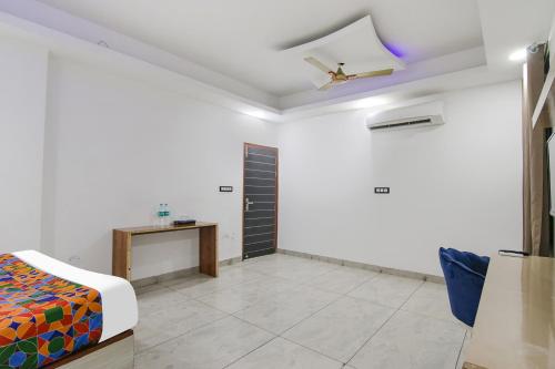 Ένα ή περισσότερα κρεβάτια σε δωμάτιο στο FabHotel The Grand Heritage