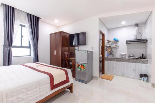 Kuchyň nebo kuchyňský kout v ubytování Bao Ngoc Hotel & Apt