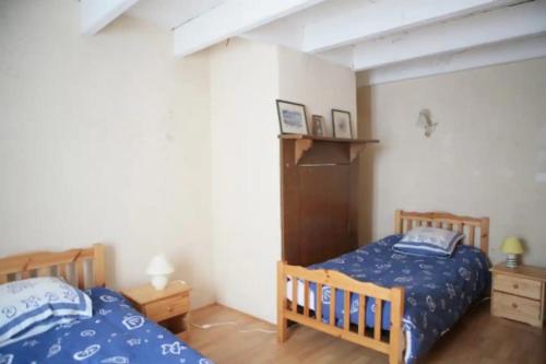 Postel nebo postele na pokoji v ubytování Maison Sarzeau Centre - La Bernache