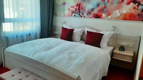 Postel nebo postele na pokoji v ubytování Apartment Vier Jahreszeiten