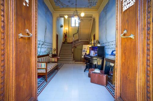 a hallway with a staircase in a building with a room at Marta Guest House in Santa Maria del Giudice