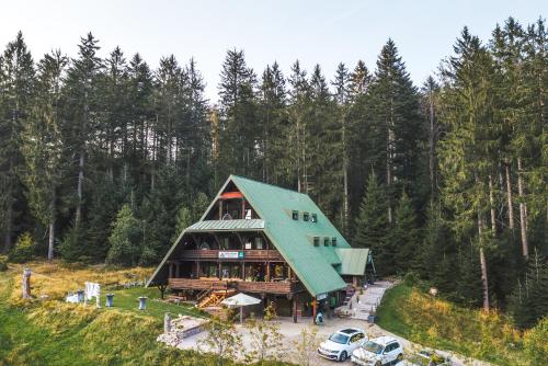 an overhead view of a house with a green roof at EDELFUCHS-LODGE in Bühlertal