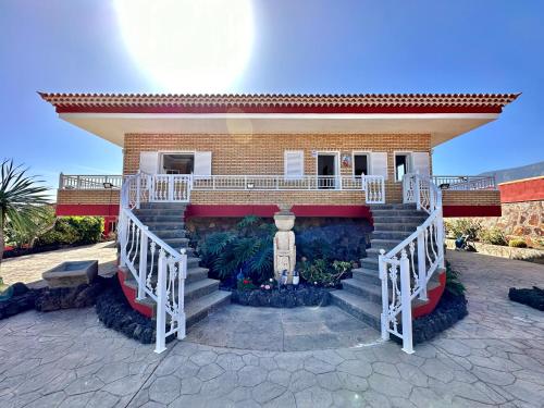 a house with a staircase in front of it at Villa Puntallana in Arafo