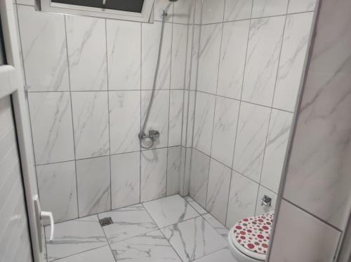a bathroom with a shower with a toilet at YASİN OTEL in Konya