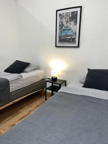 เตียงในห้องที่ Apartment Central 10A 40qm Wi-Fi free Parking calm back house