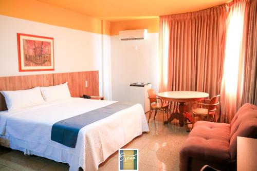 Ένα ή περισσότερα κρεβάτια σε δωμάτιο στο HOTEL OSCAR GOLD