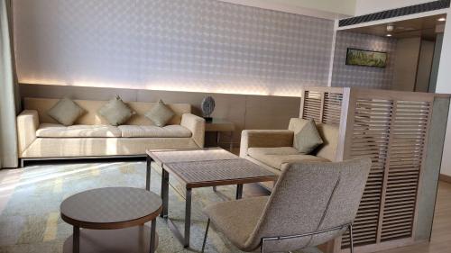 Posezení v ubytování Radisson Blu Hotel, Greater Noida