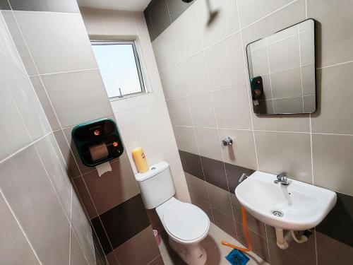 a small bathroom with a toilet and a sink at Pavilionvillie M1T692 by irainbow in Ipoh