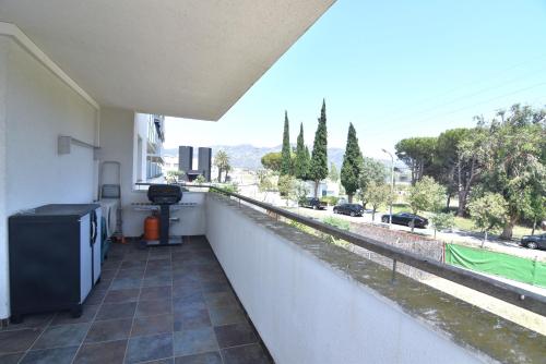 RNET - PORTOMAR 126 - Apartamento en Santa Margarita, Roses: Gran Terraza, Aire Acondicionado, Parking.
