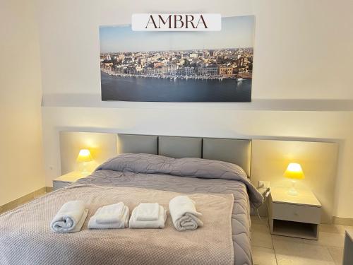 Ένα ή περισσότερα κρεβάτια σε δωμάτιο στο Residence Lori