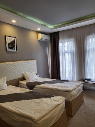 Jupiter -ZamZam-Madinah Halal Hotels Groupにあるベッド