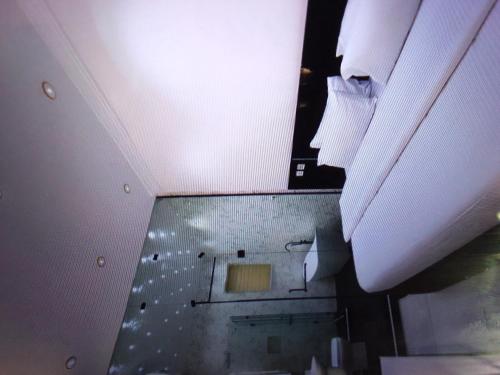 an overhead view of a bathroom with a broken ceiling at LINCOLN royale HOTEL, CALABAR in Calabar