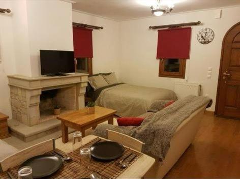 Televízia a/alebo spoločenská miestnosť v ubytovaní Castle Suite