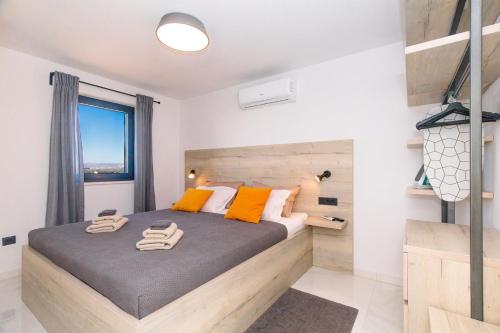 Ένα ή περισσότερα κρεβάτια σε δωμάτιο στο Luxury Apartment Sea View Punat