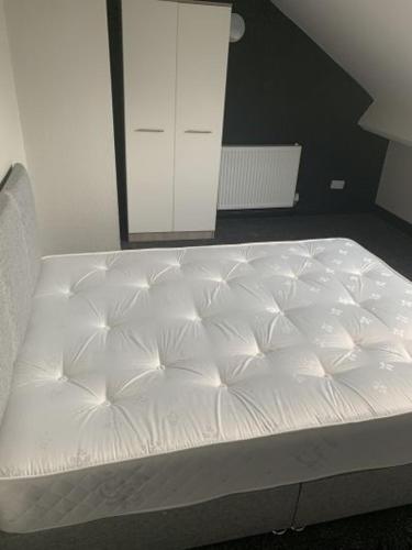 Un pat sau paturi într-o cameră la Silcoates Houser