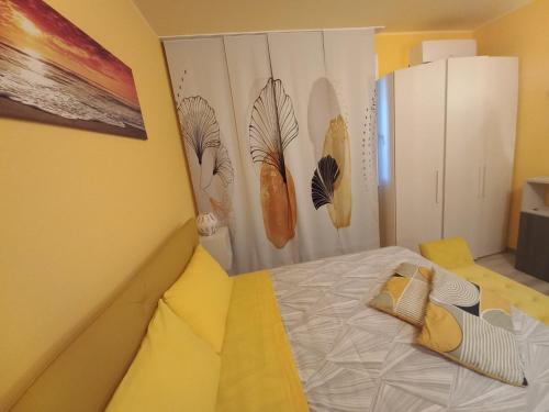 Postel nebo postele na pokoji v ubytování Chalet al mare