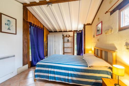 Postel nebo postele na pokoji v ubytování Le Cottage - Gîtes De La Tournerie