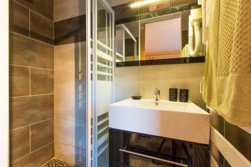 a bathroom with a sink and a shower at Chalet de 7 chambres avec terrasse et wifi a Saint Gervais les Bains in Saint-Gervais-les-Bains