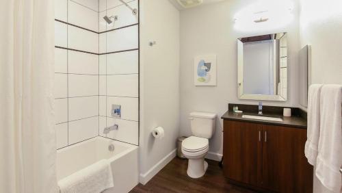 a bathroom with a toilet and a sink and a shower at Landing Modern Apartment with Amazing Amenities (ID3724) in Las Vegas