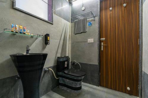Kúpeľňa v ubytovaní IRIS HEAVEN'Z by Radha Rani Resort