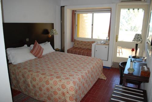 Voodi või voodid majutusasutuse Hotel Moulay Yacoub toas