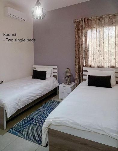 Letto o letti in una camera di Elite Residence - Koura , Near Tripoli