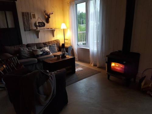Sainte-Germaine-du-Lac-EtcheminにあるCHALET RIVIÈRE ETCHEMINS, Un endroit uniqueのギャラリーの写真