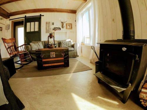 Sainte-Germaine-du-Lac-EtcheminにあるCHALET RIVIÈRE ETCHEMINS, Un endroit uniqueのギャラリーの写真