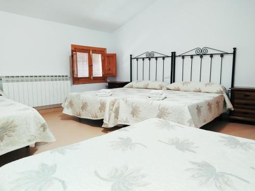 Postelja oz. postelje v sobi nastanitve Cortijos Rurales Castril, El Moro
