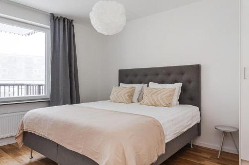 Postelja oz. postelje v sobi nastanitve Modern Scandinavian Home in Stockholm