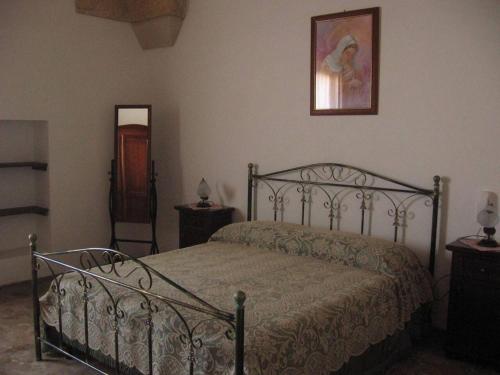 מיטה או מיטות בחדר ב-2 bedrooms appartement with terrace at Sternatia