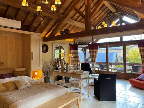 Posezení v ubytování Chambre d'hôtes - Le Refuge de la Vallée