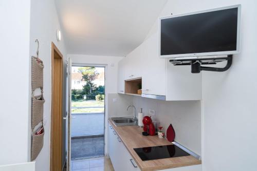 Kuchyň nebo kuchyňský kout v ubytování Apartment Jasna Gorica Dubrovnik