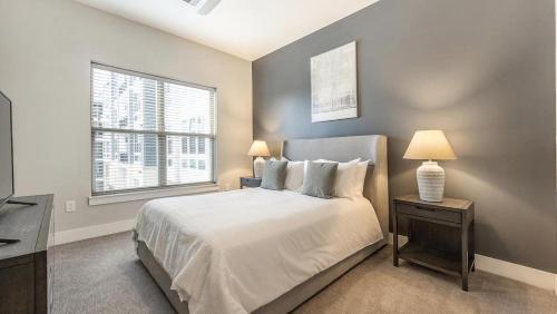 A bed or beds in a room at Landing Modern Apartment with Amazing Amenities (ID7741X92)