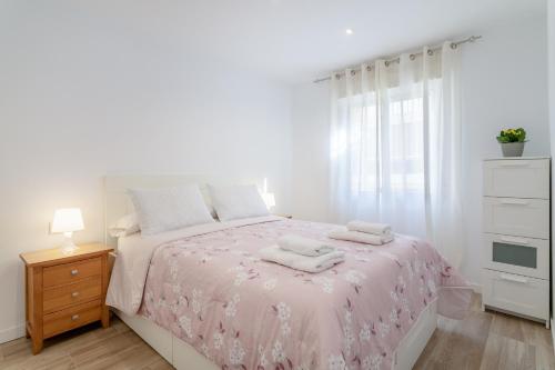 Ένα ή περισσότερα κρεβάτια σε δωμάτιο στο Apartamento Sotillo
