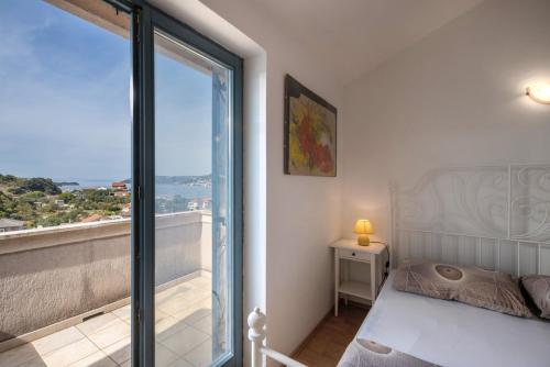 Posteľ alebo postele v izbe v ubytovaní Apartments Lapida