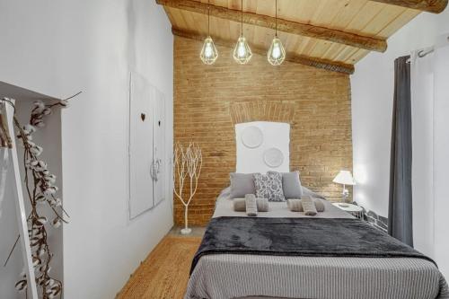 Tempat tidur dalam kamar di Casa da Travessa - Lago do Alqueva