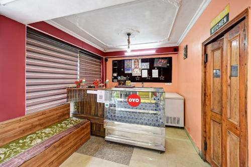 a soda shop with a stop sign in a room at Woods Imperial Kufri in Shimla
