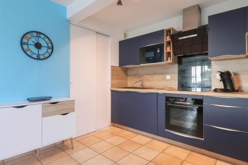 Η κουζίνα ή μικρή κουζίνα στο Appartement avec balcon - centre de Sarzeau