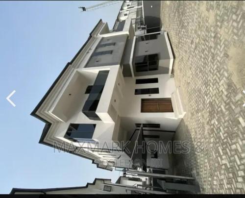 a building with balconies on the side of a building at Emmatuxz Properties in Lagos