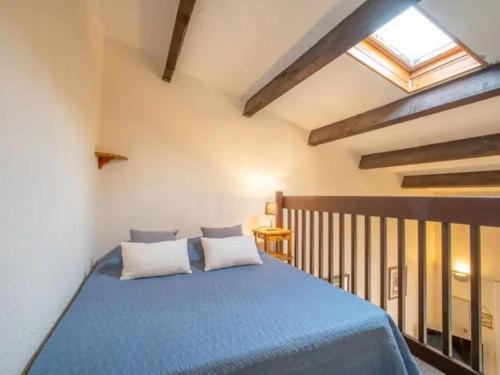 En eller flere senge i et værelse på St Cyprien superbe maison de vacances